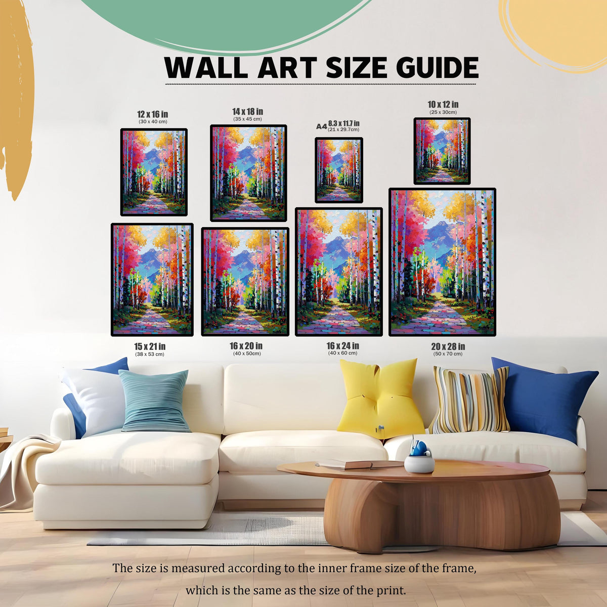 Wall Art Size Guide image showing 8 different framed sizes of the colorful Aspen forest print displayed above a white sectional couch. Sizes include 12x16, 14x18, A4, 10x12, 15x21, 16x20, 16x24, and 20x28 inches.