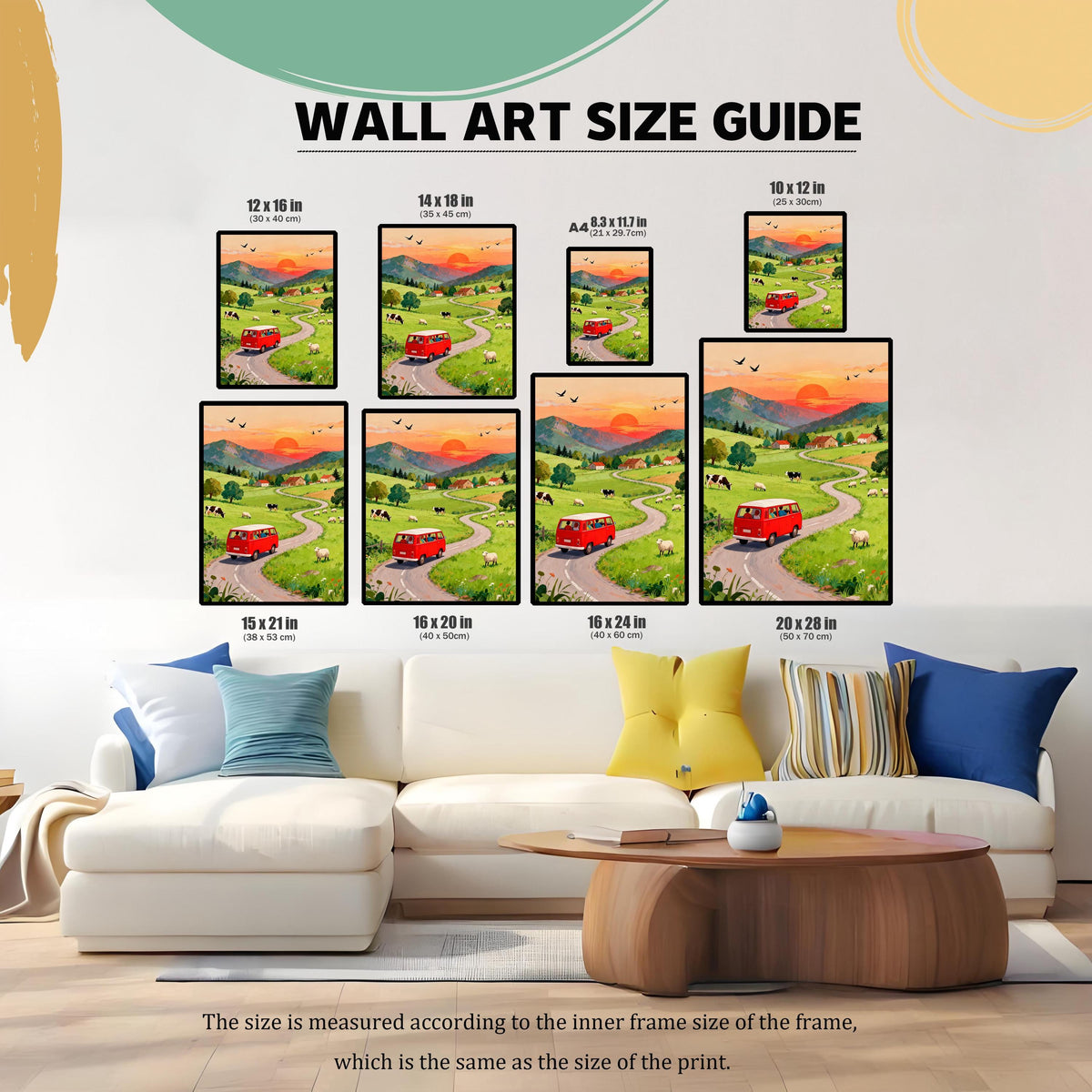 A Wall Art Size Guide graphic showing various print sizes (10x12, 12x16, 14x18, A4, 15x21, 16x20, 16x24, 20x28 inches) over a large white sofa to demonstrate scale in a living room setting.