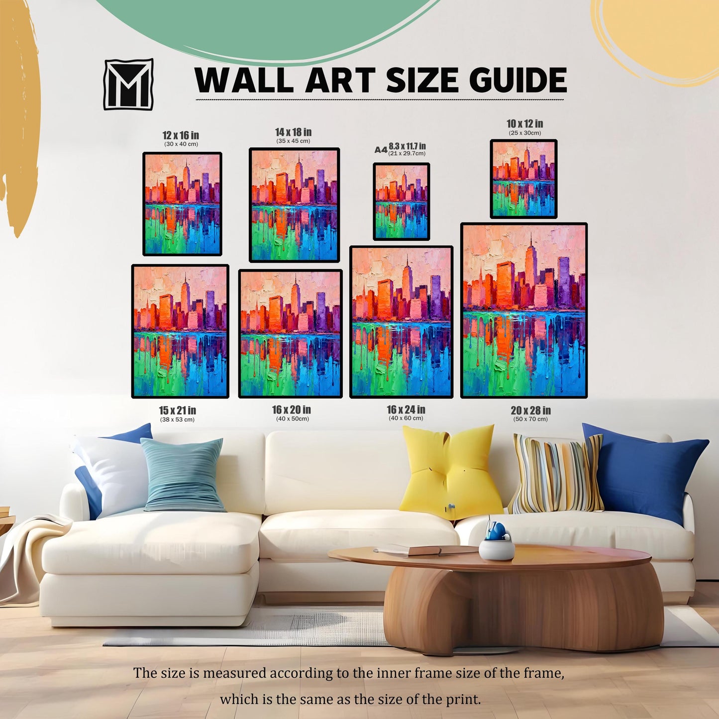 A "WALL ART SIZE GUIDE" graphic shows the colorful skyline print in eight different sizes (e.g., 12x16 in, 20x28 in) arranged above a large white sectional sofa.
