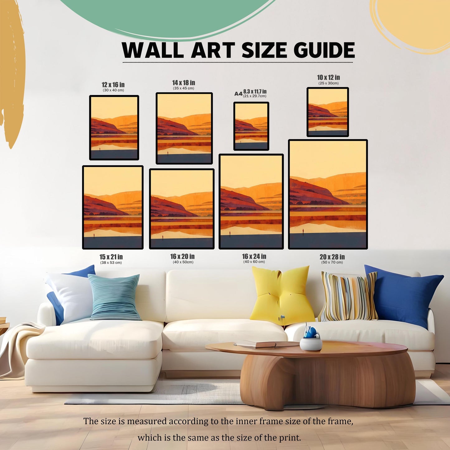 Wall art size guide showing various print dimensions from 10x12 in to 20x28 in hanging above a modern white sofa with blue and yellow pillows.