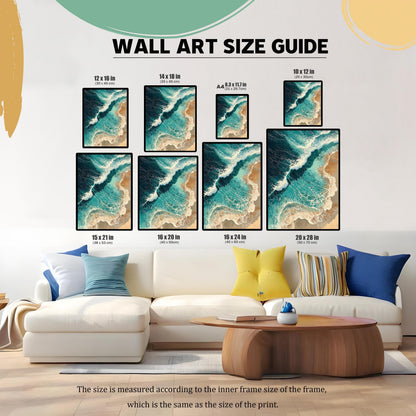 A size guide shows a variety of framed art prints placed above a white couch. The prints are in different sizes and orientations, demonstrating how they would look as wall art. The art shows an aerial view of waves on a beach.