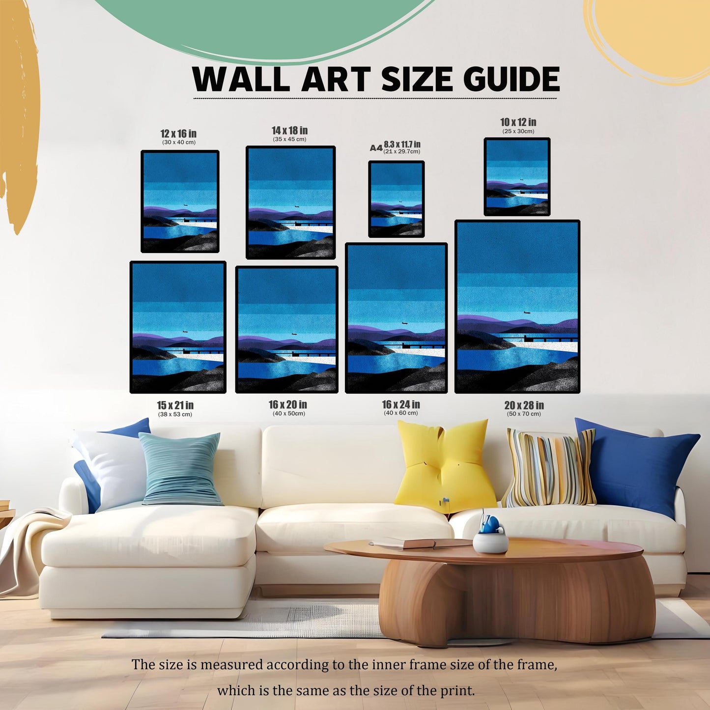 A comprehensive wall art size guide showing various dimensions from 10x12 inches to 20x28 inches displayed above a white sectional sofa with blue and yellow pillows.