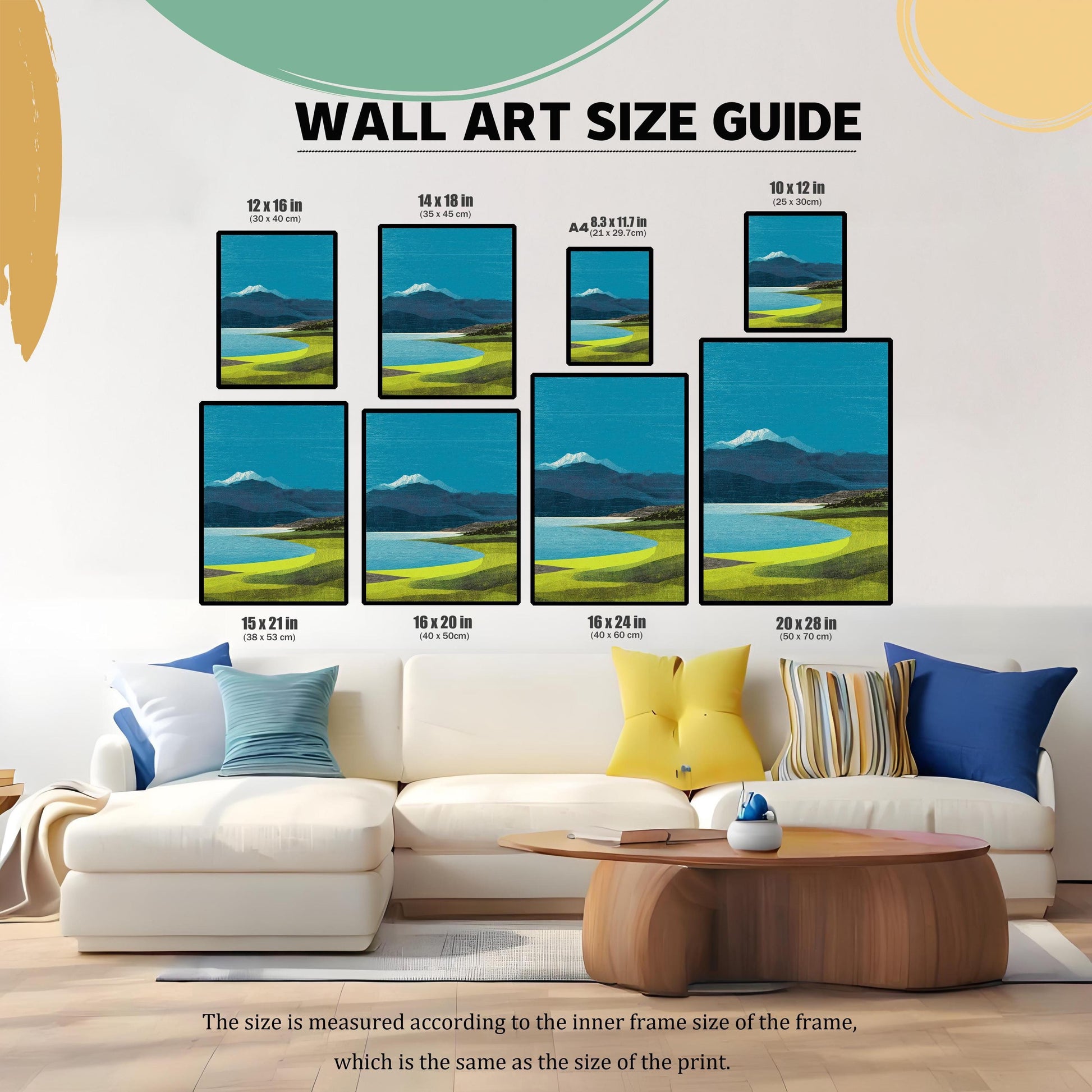 Wall art size guide showing various print dimensions from 10x12 inches to 20x28 inches displayed above a white modern sofa for scale.