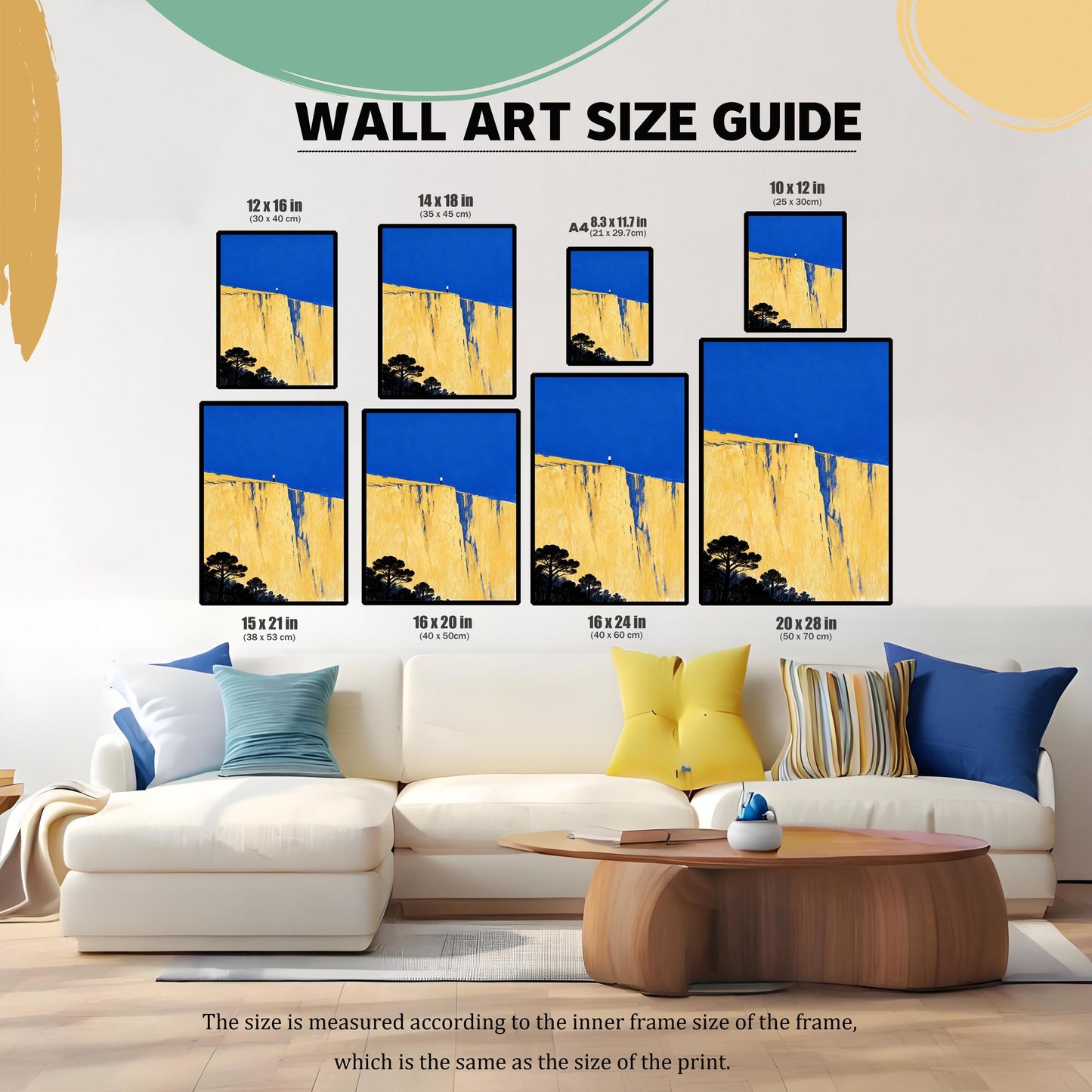 WALL ART SIZE GUIDE graphic showing the cliff art print in various dimensions (12x16 in, 14x18 in, A4, 10x12 in, 15x21 in, 16x20 in, 16x24 in, 20x28 in) displayed above a white sofa in a living room setting for scale.
