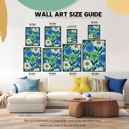 Wall Art Size Guide graphic. The blue and green floral pattern artwork is shown in eight different sizes placed above a sofa in a living room, illustrating how the print sizes look in context: 12x16 in, 14x18 in, A4 (8.3x11.7 in), 10x12 in, 15x21 in, 16x20 in, 16x24 in, and 20x28 in.