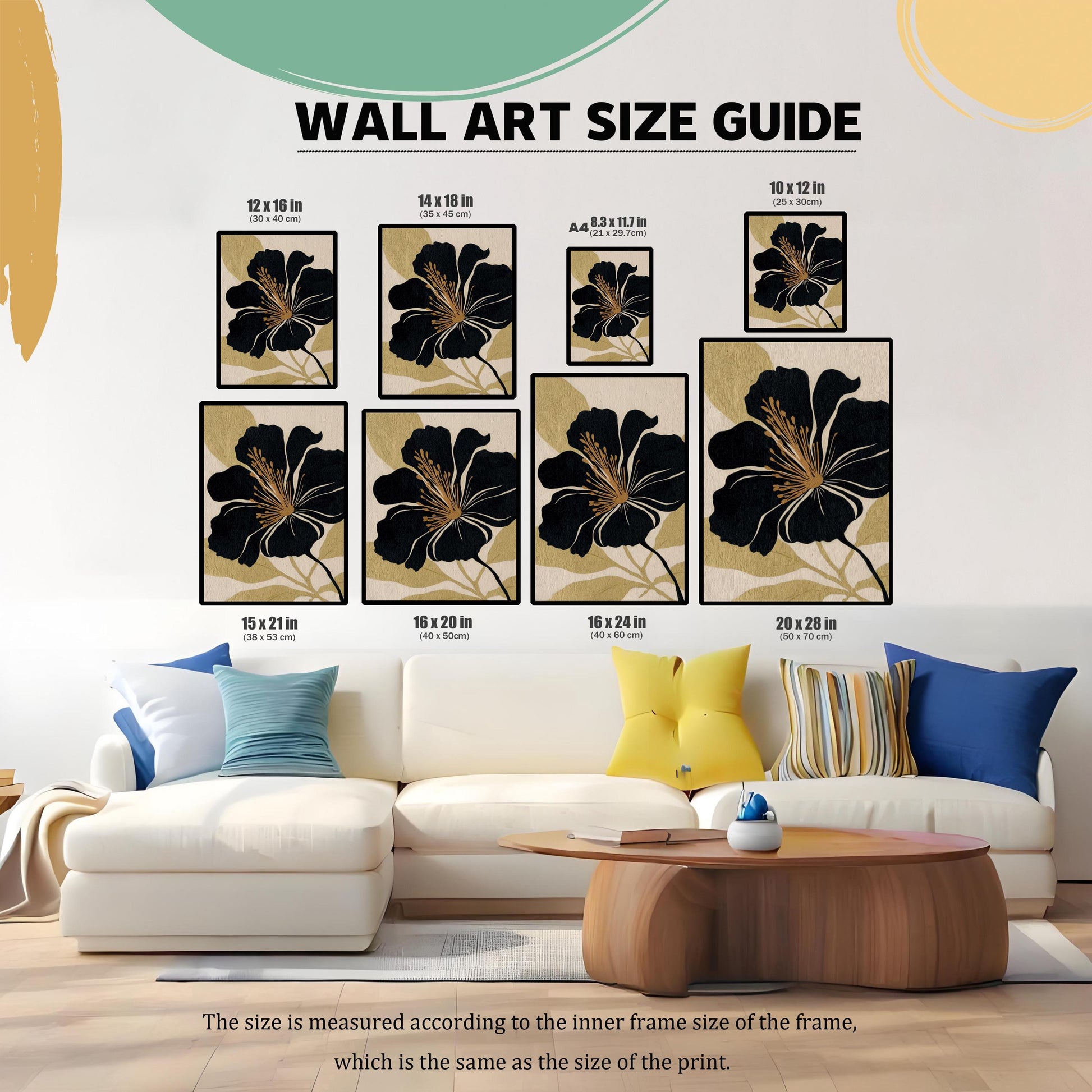 A Wall Art Size Guide graphic showing various print sizes (10x12, 12x16, 14x18, A4, 15x21, 16x20, 16x24, 20x28 inches) with their centimeter equivalents, displayed above a large white sofa to show scale in a living room setting.