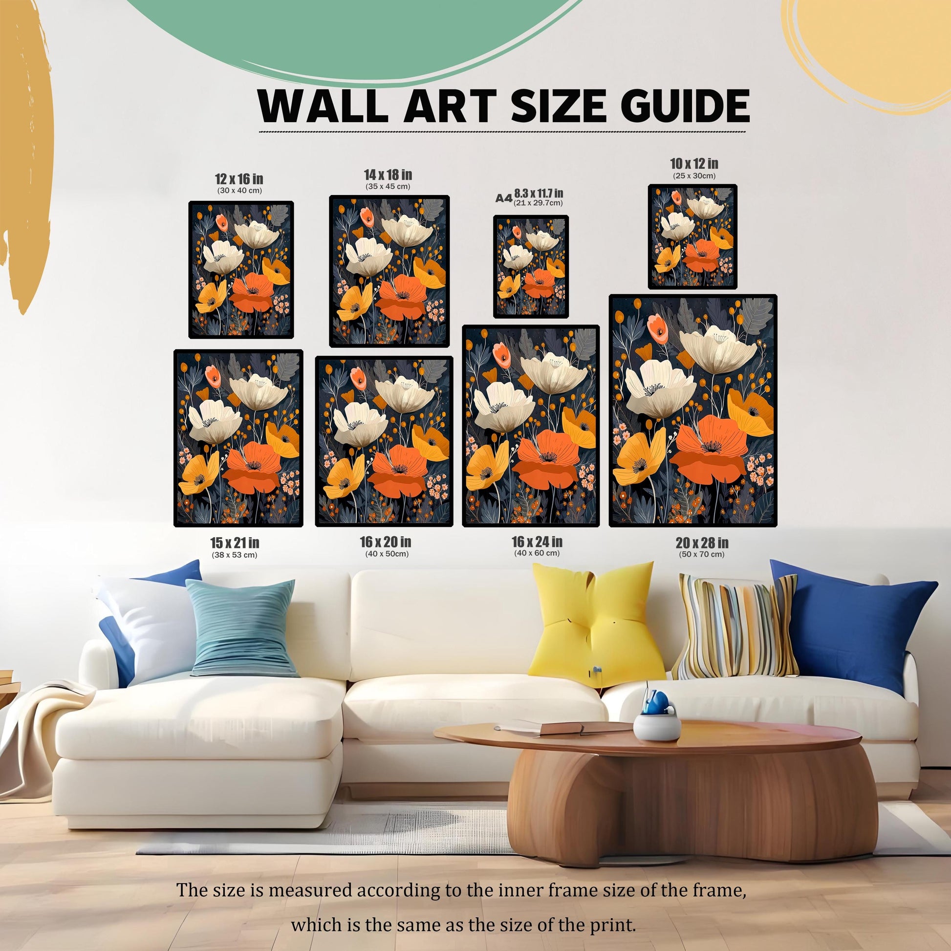 Wall Art Size Guide showing various frame sizes (e.g., 12×16 in, 16×20 in, 20×28 in) of the floral art as they would look hung over a large, white sofa and coffee table in a living room.