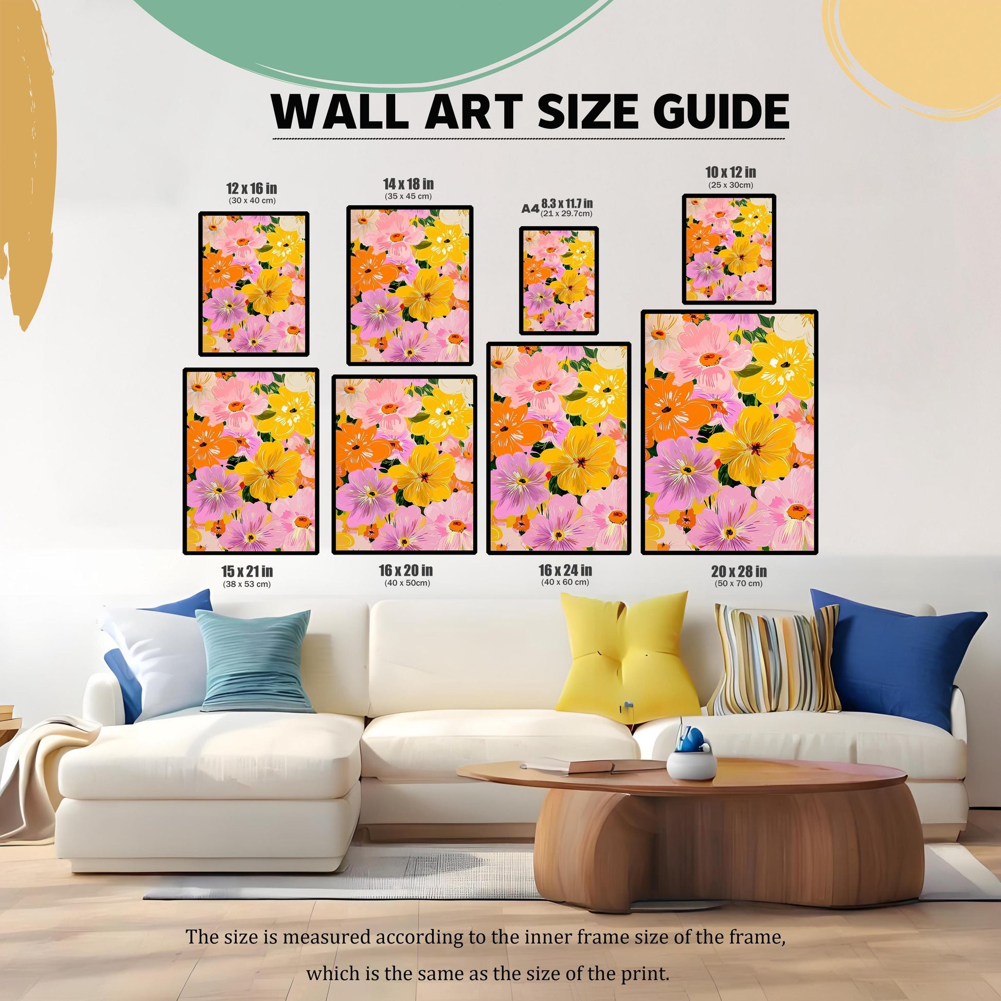 Wall Art Size Guide image showing the framed floral print in various sizes displayed on a wall above a white sectional sofa. Sizes range from 10×12 in to 20×28 in. Text notes the size is measured according to the inner frame size/print size.