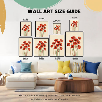 A living room scene with a couch, displaying a gallery wall of framed poppy art in different sizes.