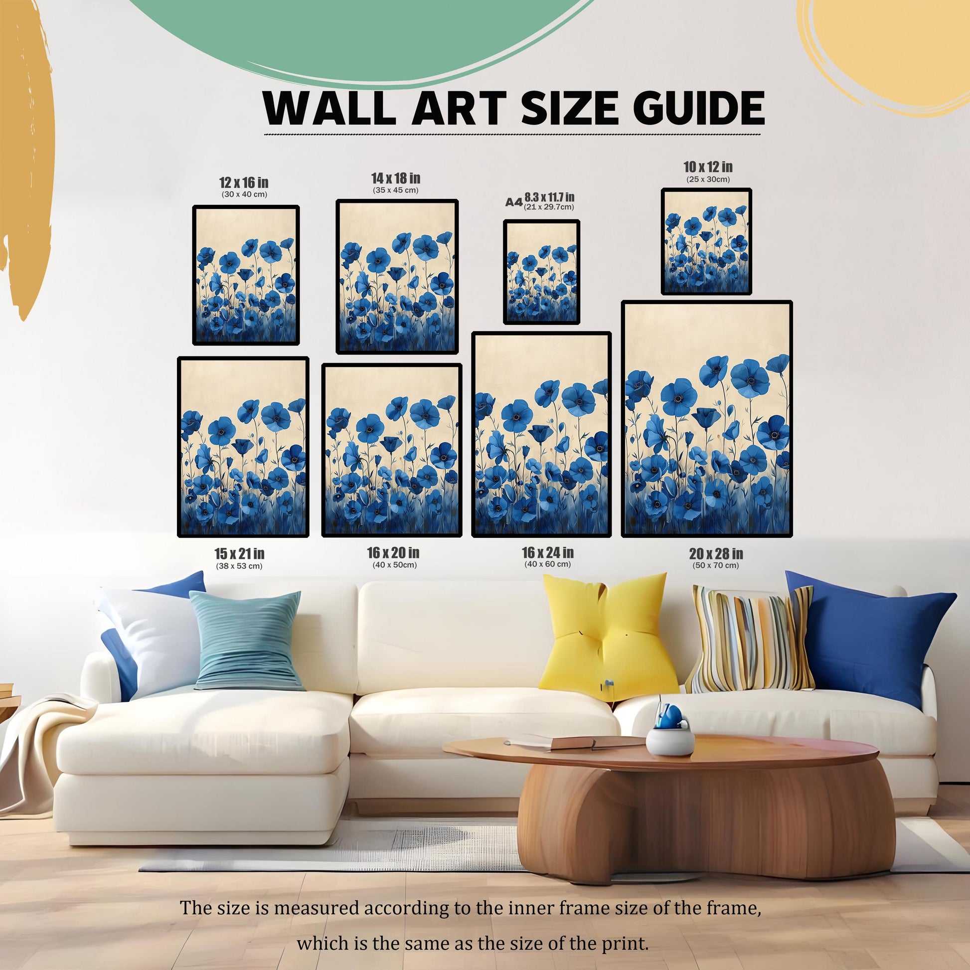 A wall art size guide displays the blue floral print in various sizes above a modern couch, helping to visualize how different dimensions would look.