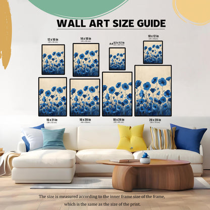 A wall art size guide displays the blue floral print in various sizes above a modern couch, helping to visualize how different dimensions would look.