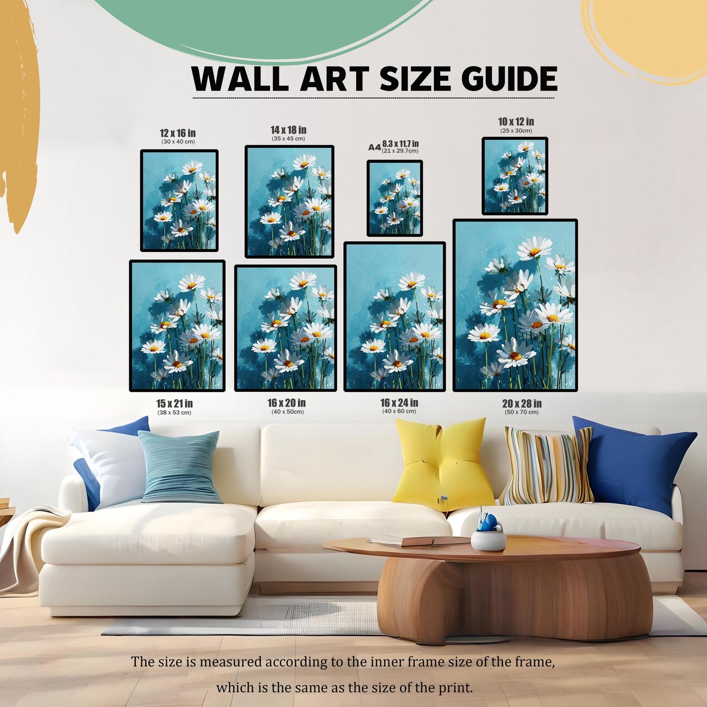 A living room with a couch and coffee table, showing multiple sizes of wall art with a daisy pattern arranged on the wall to demonstrate a size guide.