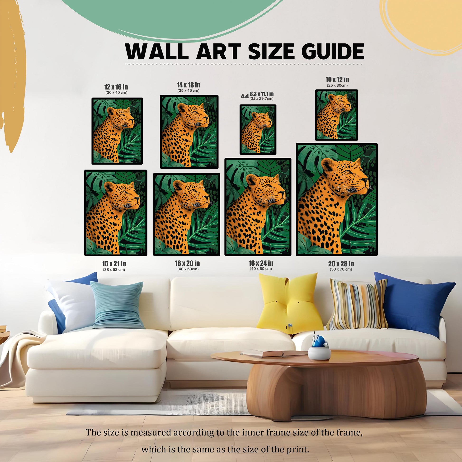 Wall Art Size Guide image showing the framed leopard print in various sizes displayed on a wall above a white sectional sofa. Sizes range from 10×12 in to 20×28 in. Text notes the size is measured according to the inner frame size/print size.