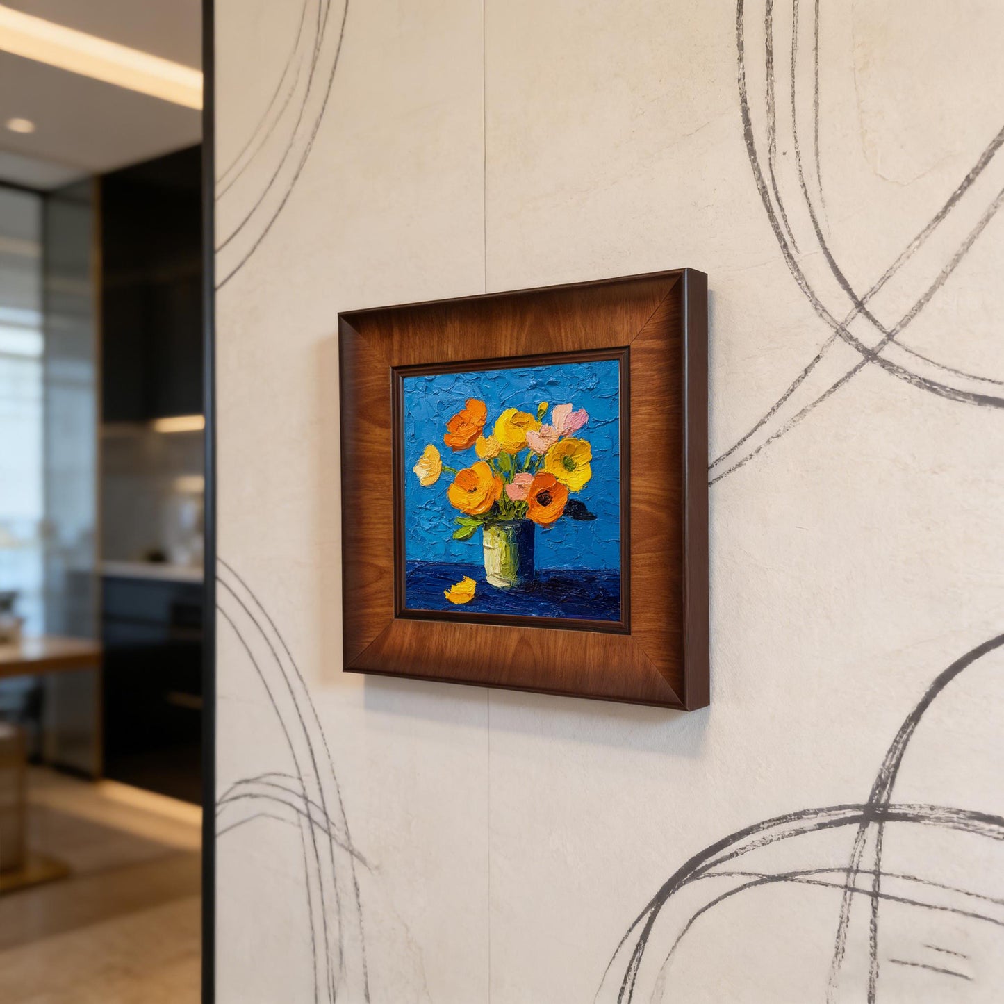Modern square framed flower painting hung on a neutral wall with minimalist black line art patterns in a bright, contemporary interior.