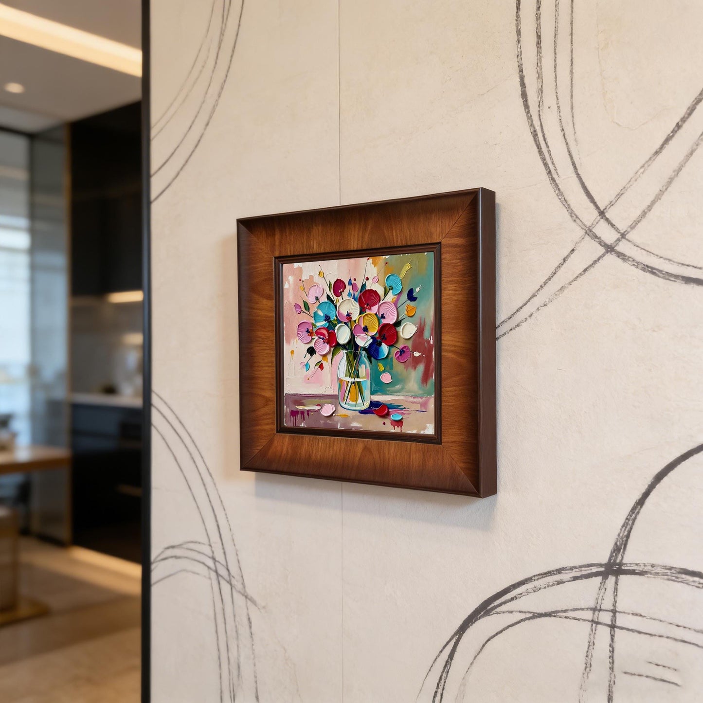 Perspective view of a textured floral art piece in a brown wood frame mounted on a stylish cream wallpapered wall with abstract black line art.