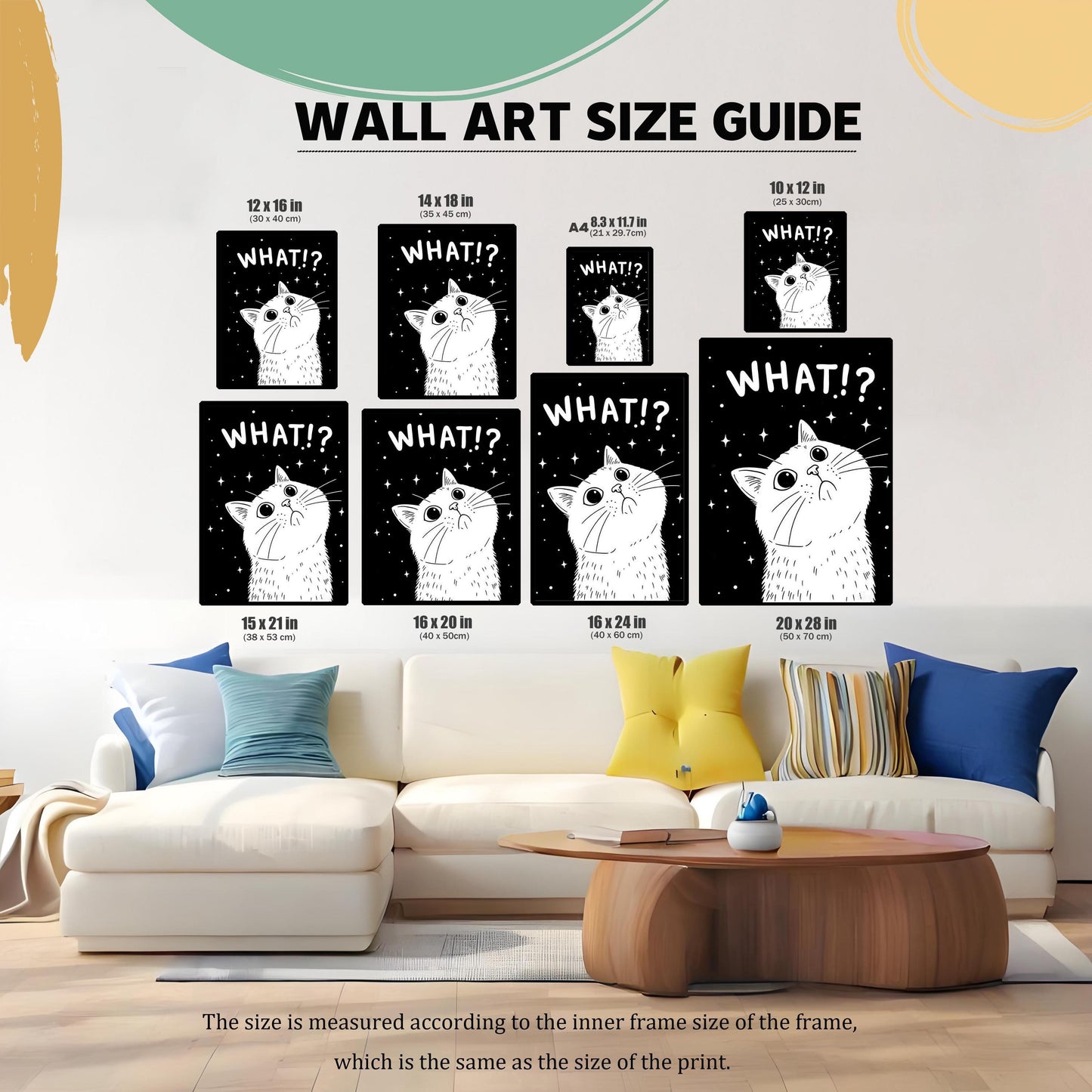 A wall art size guide showing the "WHAT!?" cat print in various sizes, from 10x12 inches to 20x28 inches, displayed above a light-colored couch.