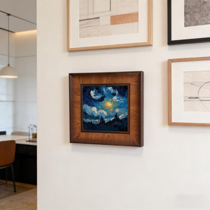 Close-up of a square wooden framed wall art piece hanging as part of a gallery wall set in a modern, bright dining area with minimalist furniture.