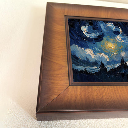Close-up side angle of a square dark wood frame showing the wood grain detail and the 3D texture of the blue impasto oil painting inside.