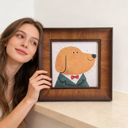 A woman leaning her head against a square wood-framed illustration of a smiling yellow dog wearing a suit, placed on a light-colored stone ledge.