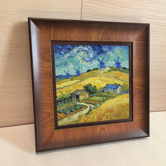 Close-up angled shot of a thick, dark walnut-finished square wooden frame featuring a vibrant post-impressionist countryside scene.